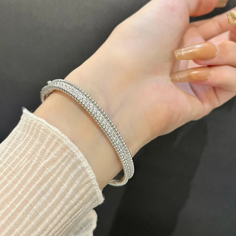 THE CELESTIAL RIVIÈRE BANGLE