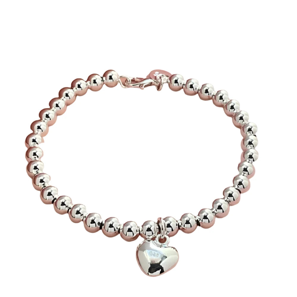 CHARMED HEART BRACELET