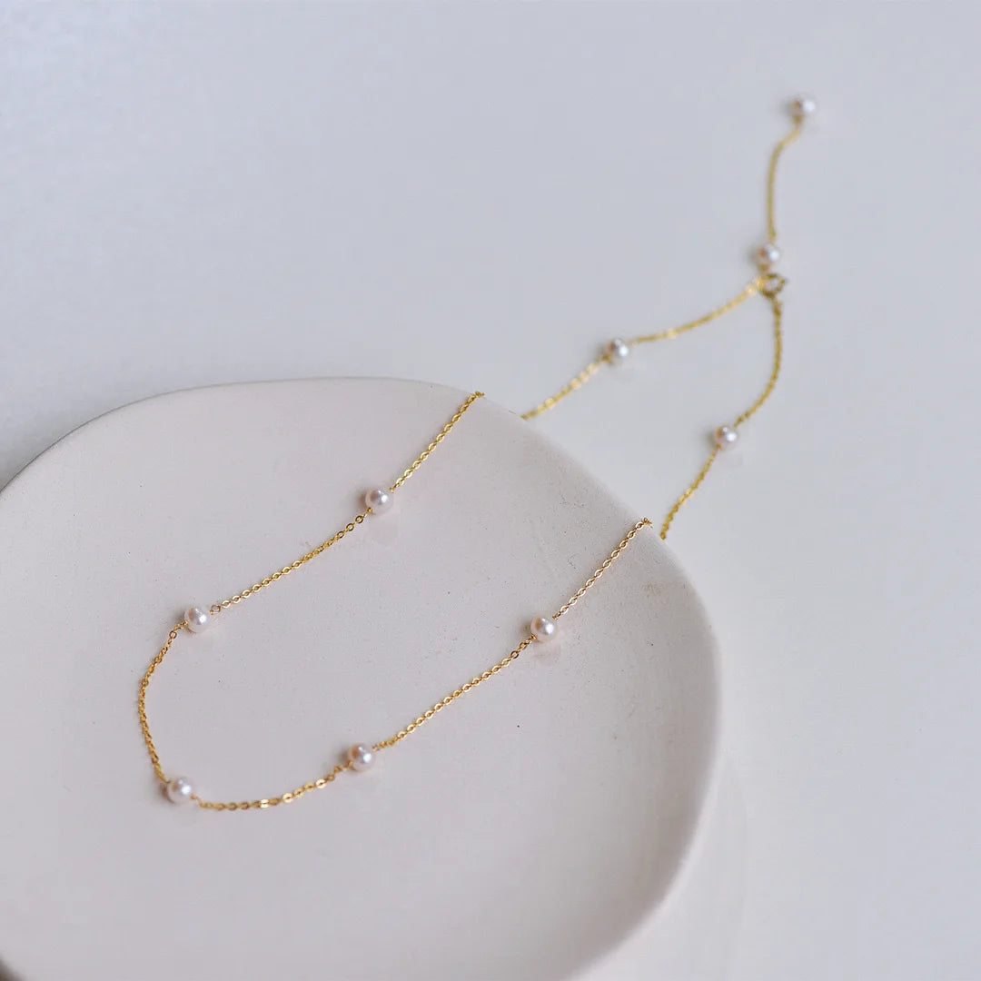 THE PEARLY NECKLACE