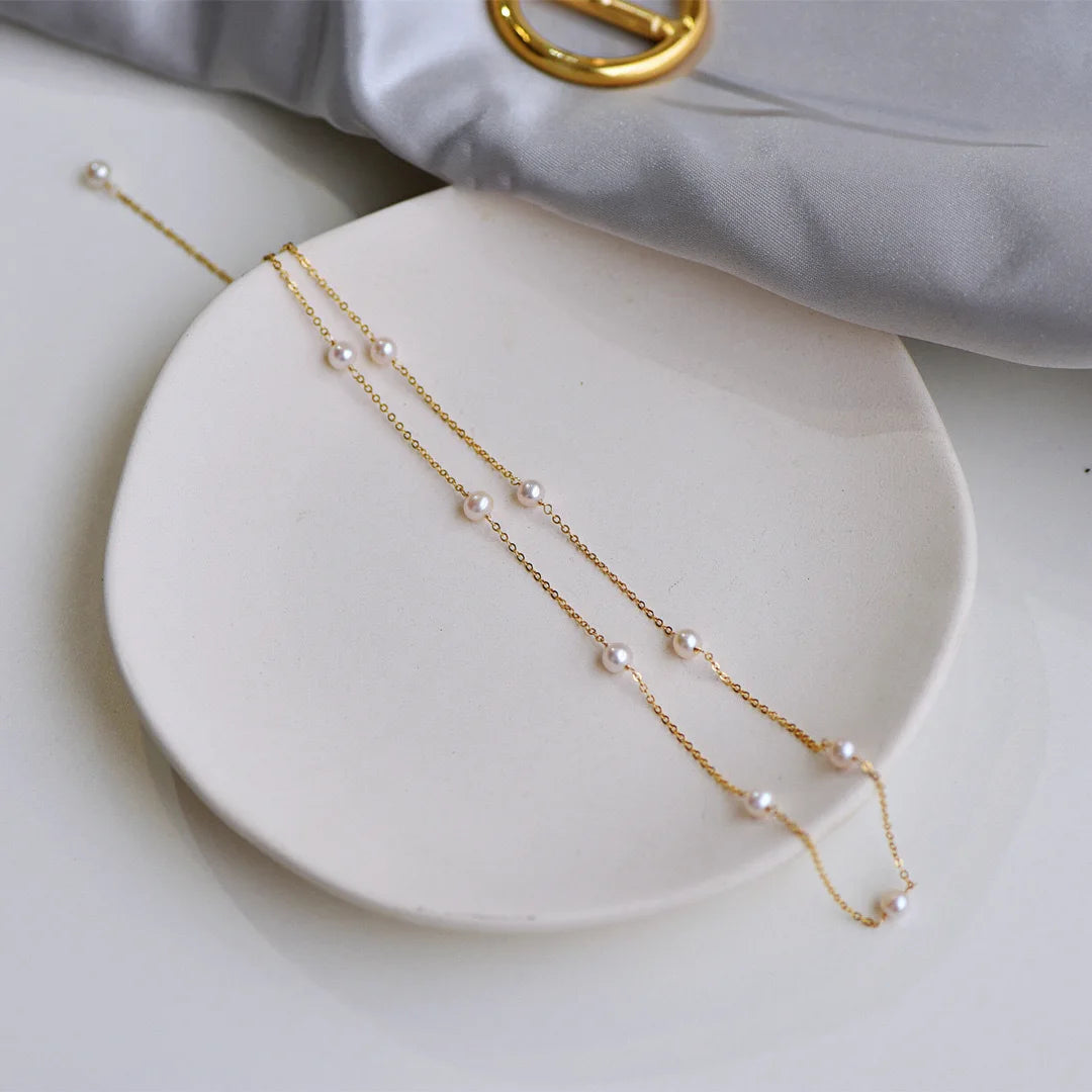 THE PEARLY NECKLACE